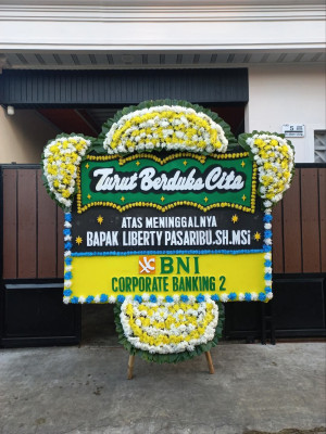 Papan Bunga Duka di Wolo