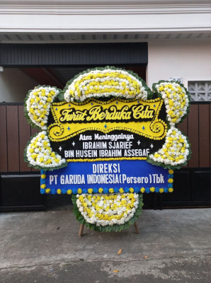 Papan Bunga Duka di Wolo